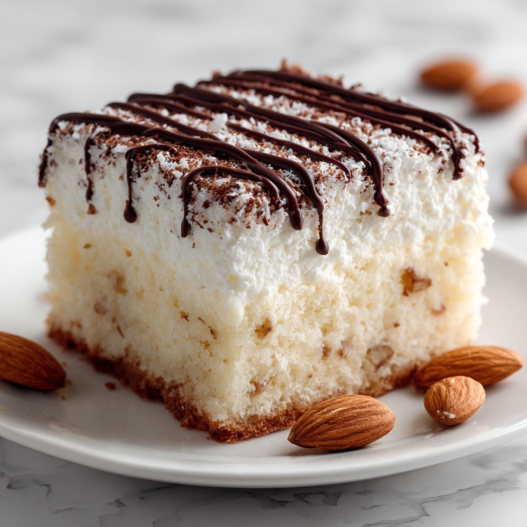 Almond Joy Poke Cake Recipe - Recipe Image
