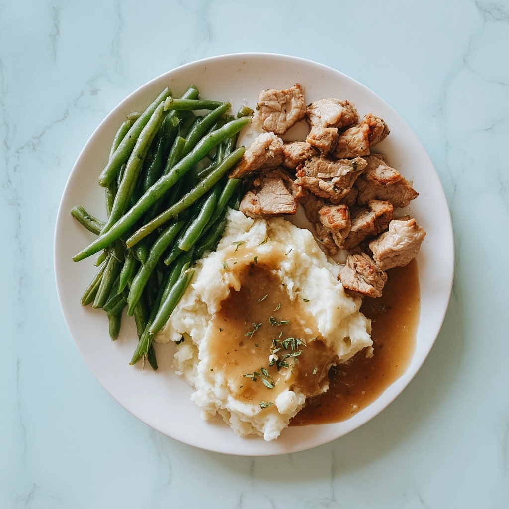Garlic Butter Steak Bites with Mashed Potatoes and Green Beans Recipe - Recipe Image